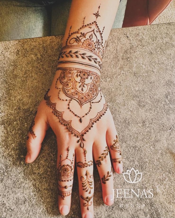 Bridal henna detail on both hands
